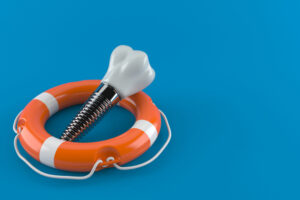 A single dental implant with a blue background in a life preserver ring.
