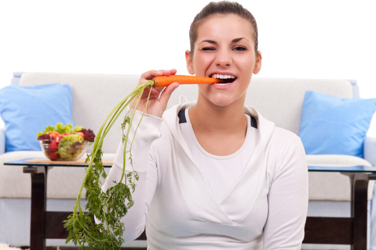 Healthy young woman with dental implants
