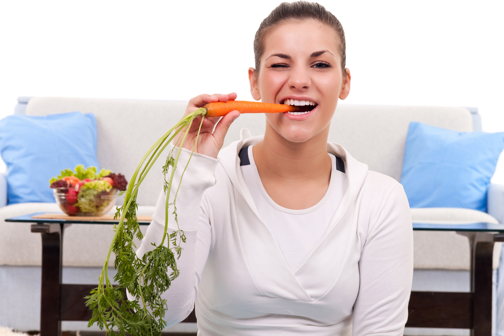 Healthy young woman with dental implants